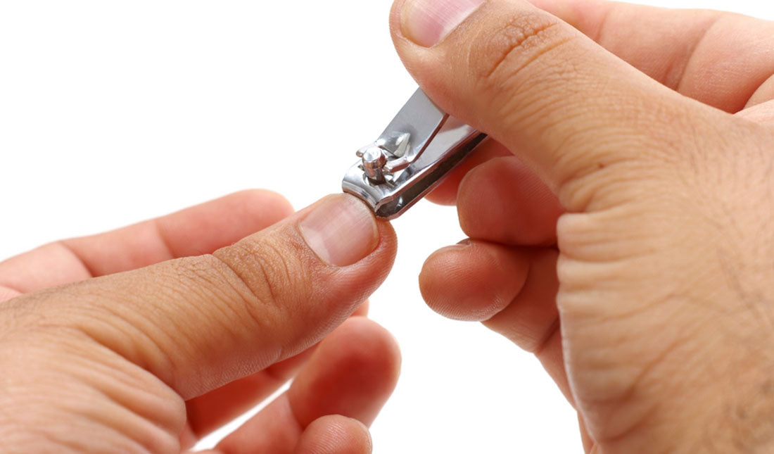 closeup clipping nails