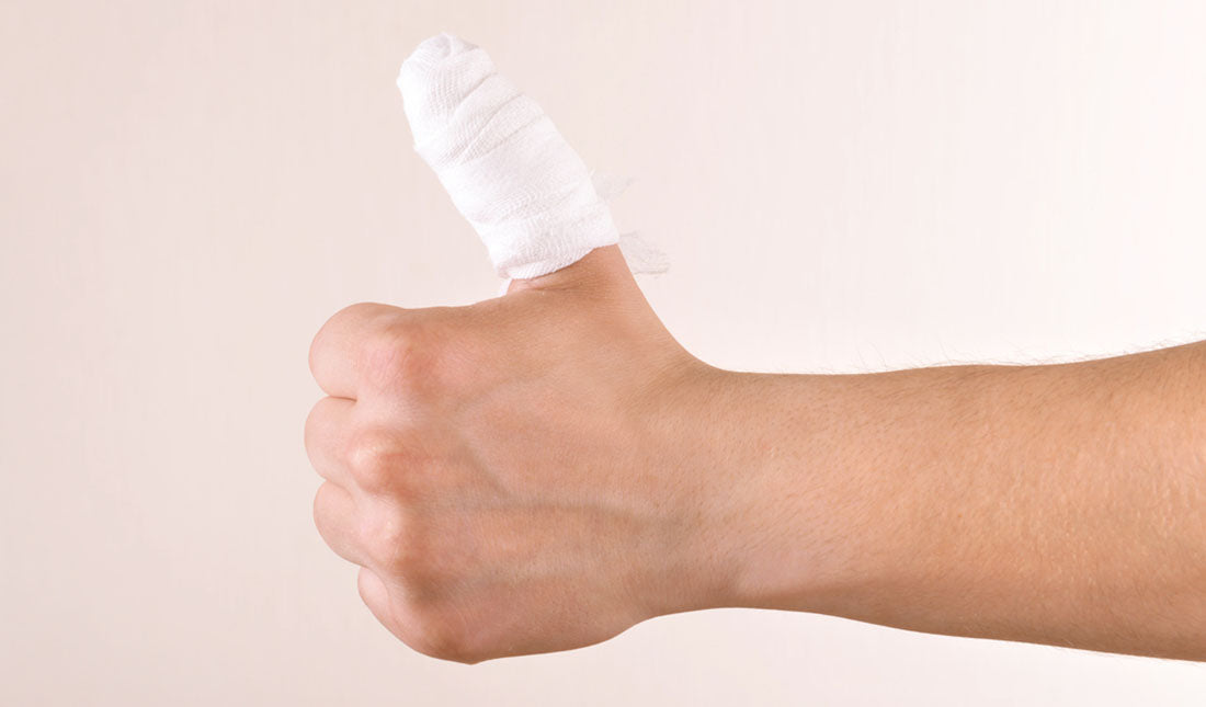 injured thumb in bandage