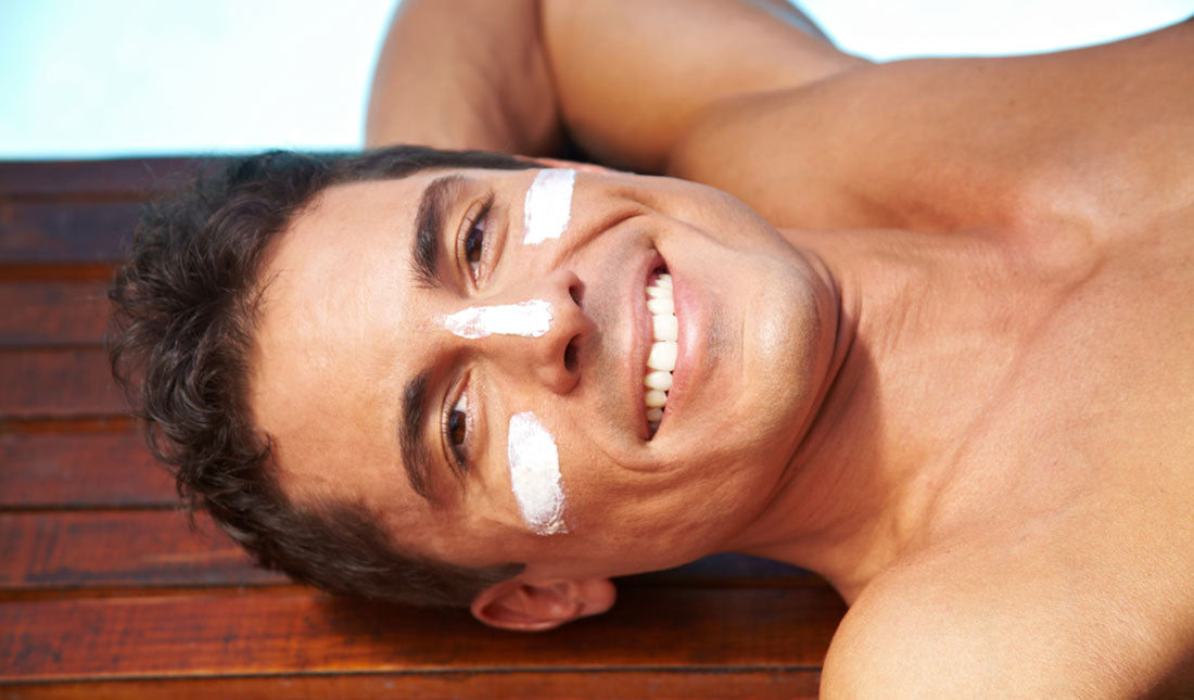 man with sunscreen under eyes