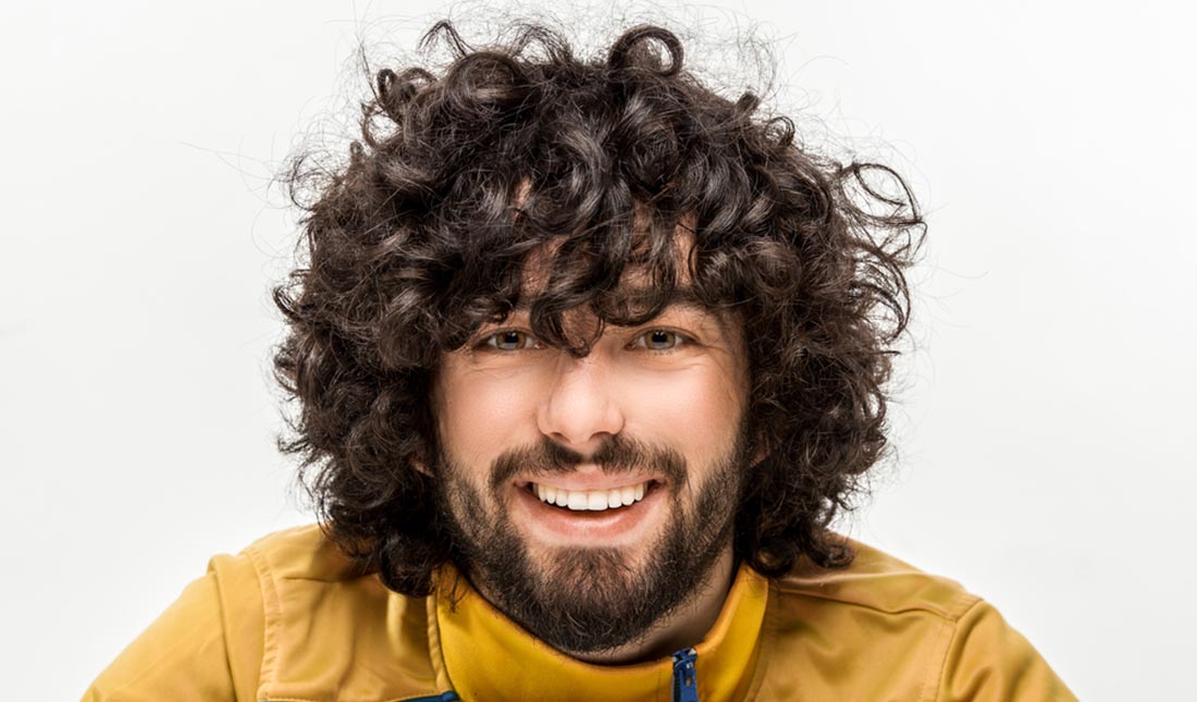 portrait of man with frizzy hair