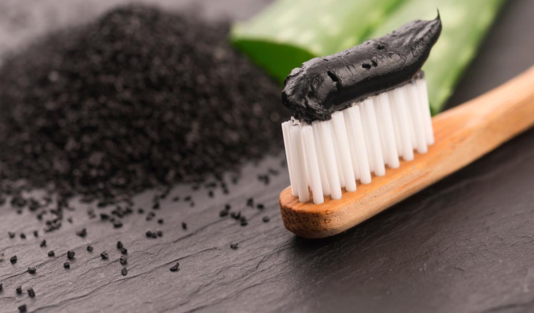 toothbrush with charcoal paste