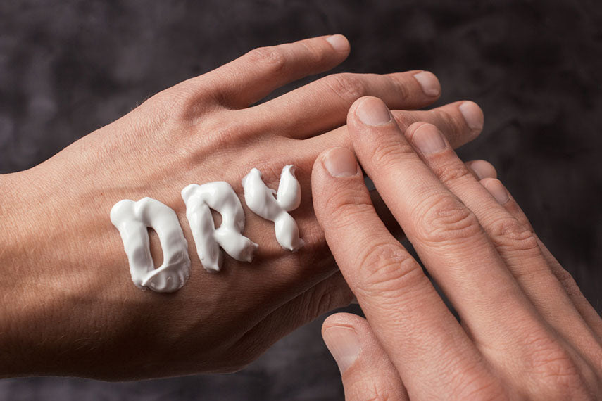 word dry written in cream on hand